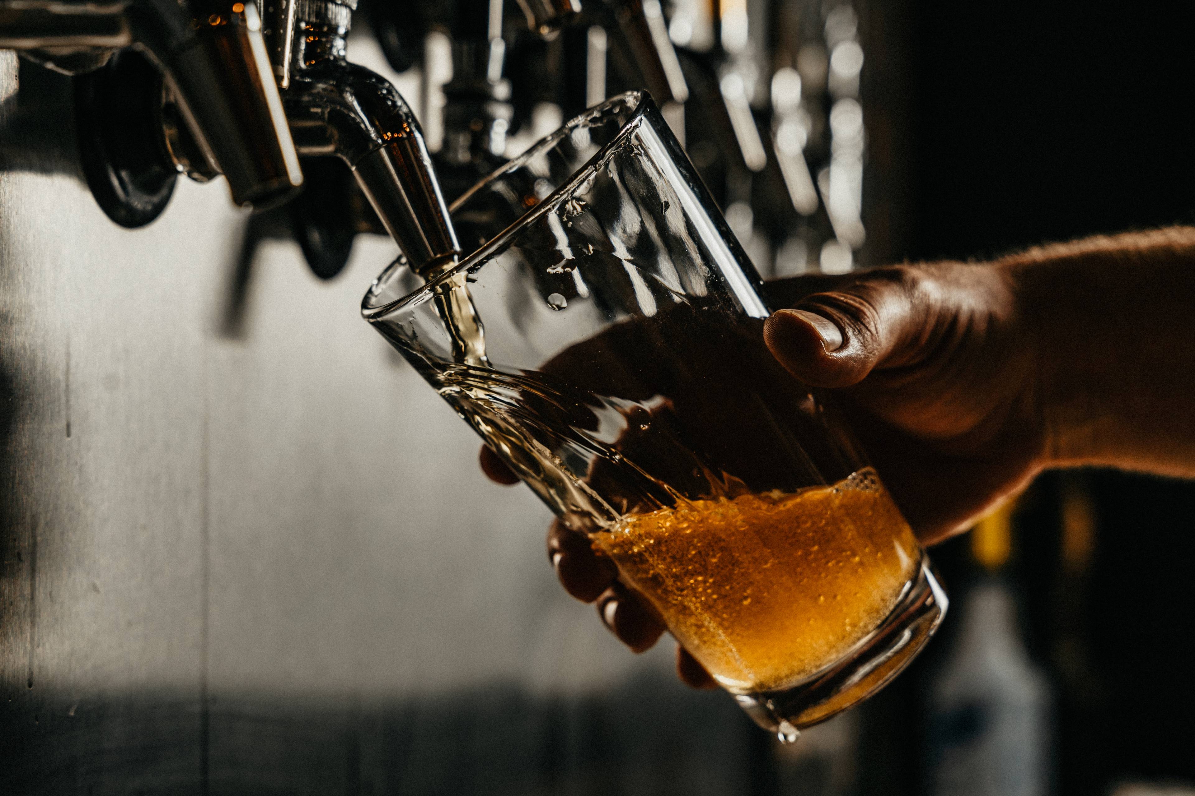 Pint of beer being poured
